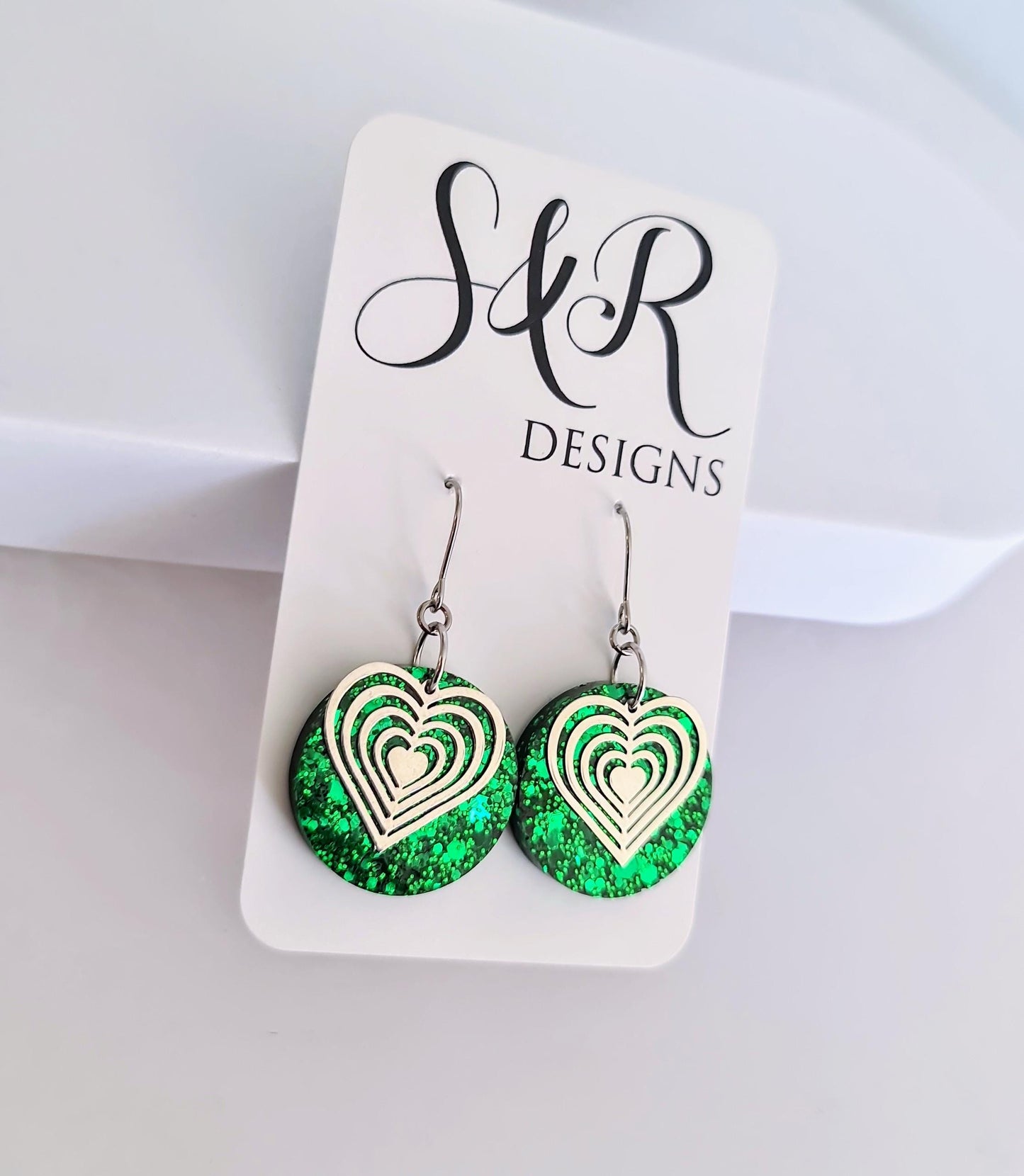 Silver Heart Emerald Green Circle Resin Drop Earrings, Statement Green Glitter Earrings, Stainless Steel Hypoallergenic Earrings.