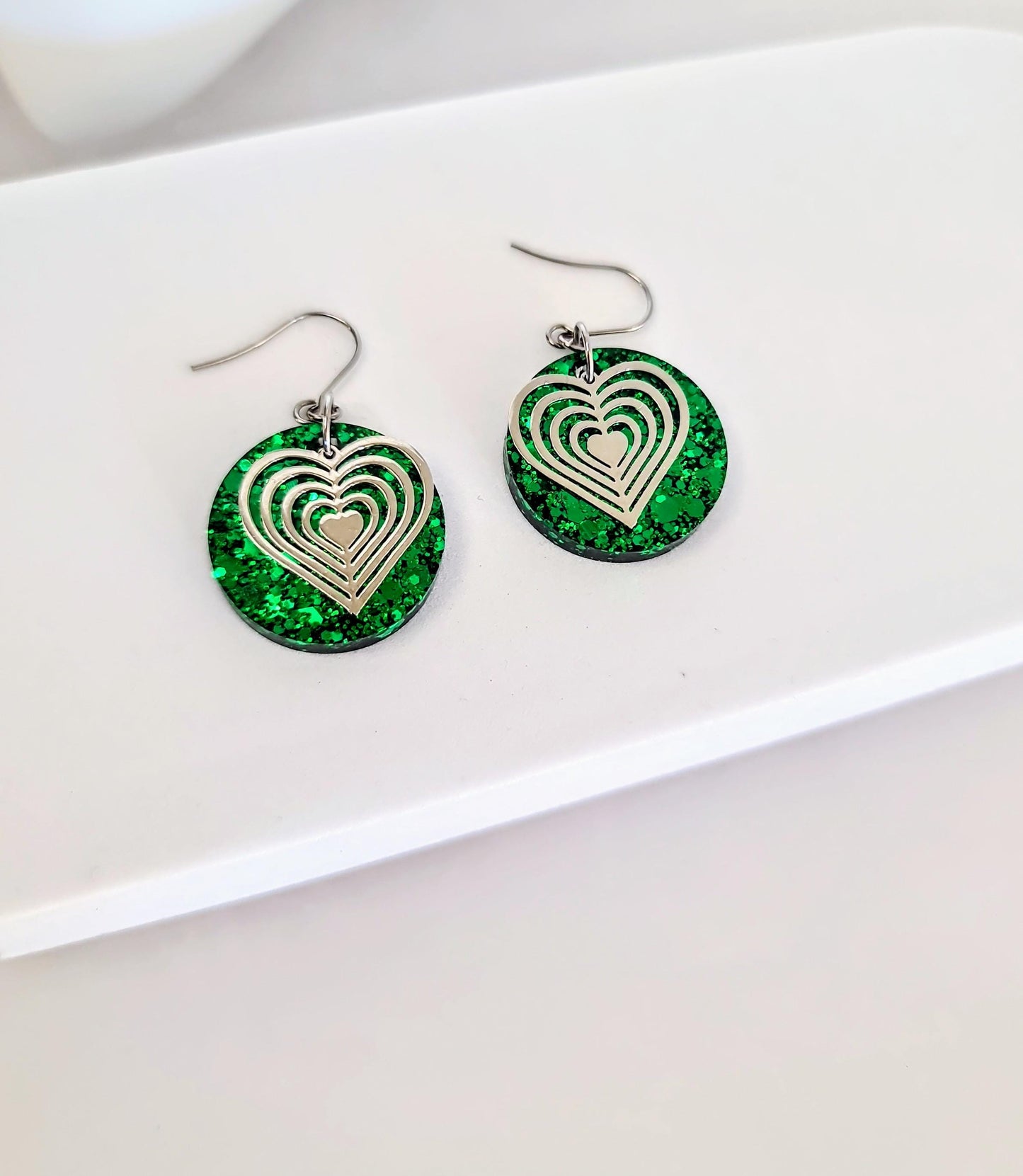 Silver Heart Emerald Green Circle Resin Drop Earrings, Statement Green Glitter Earrings, Stainless Steel Hypoallergenic Earrings.