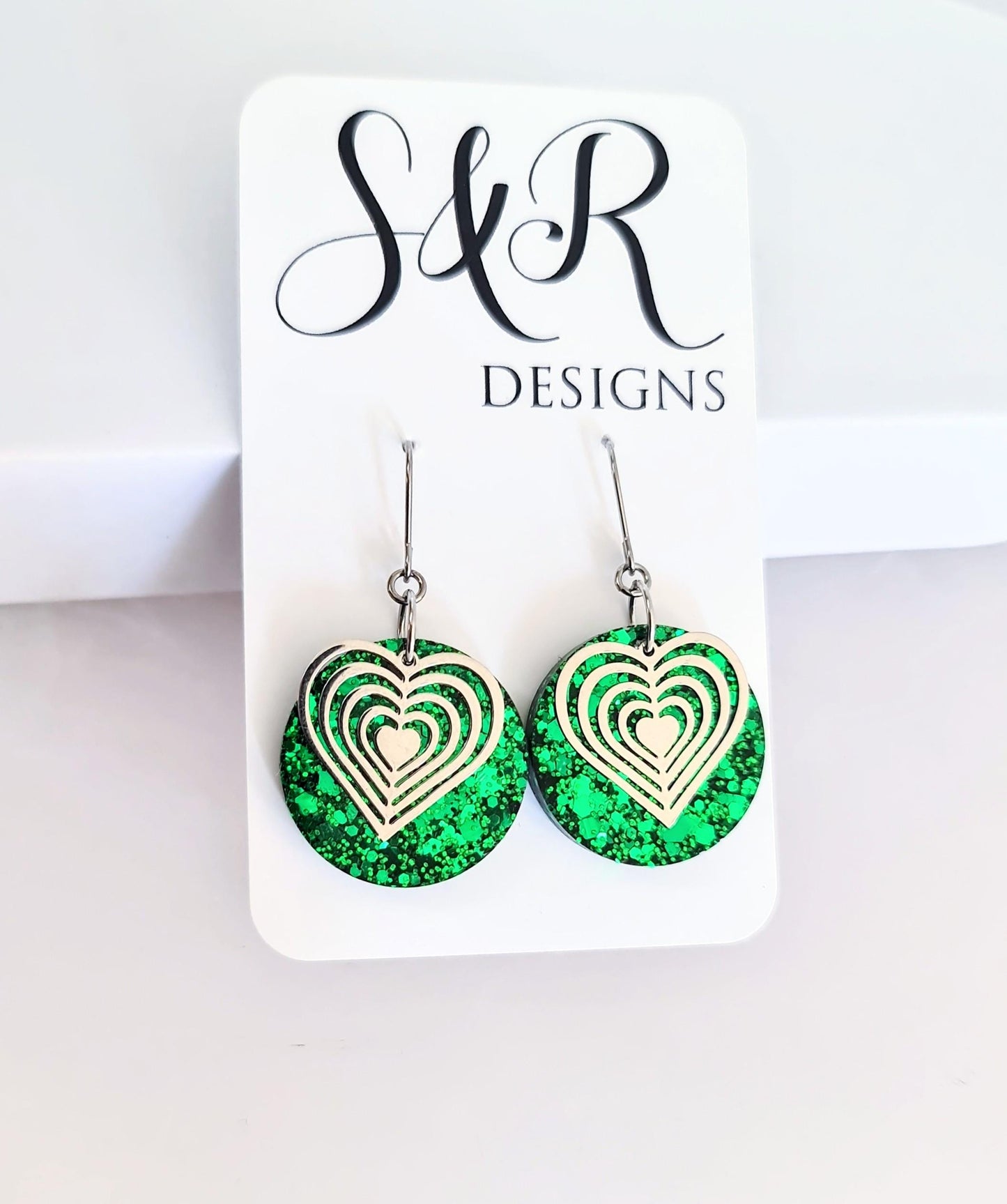 Silver Heart Emerald Green Circle Resin Drop Earrings, Statement Green Glitter Earrings, Stainless Steel Hypoallergenic Earrings.