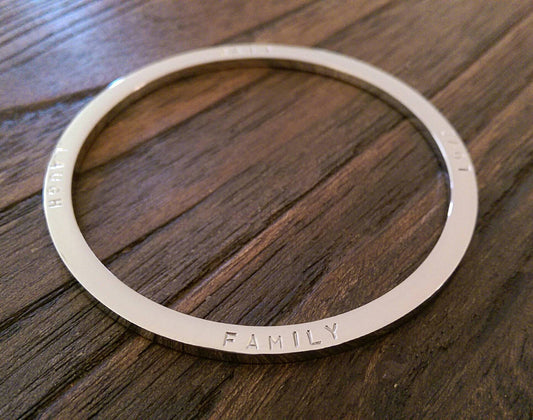 Hand Stamped Bangle Personalised Family Love Laugh Live Bangle Stainless Steel. Ready to post. Size Large 68mm inner diameter.