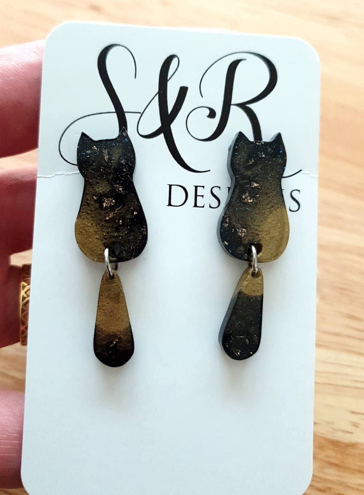 Black Gold Cat Dangle Earrings, Cat with Moving Tail Long Earrings, Black and Gold Leaf Resin Earrings, Cat Earrings Stainless Steel.