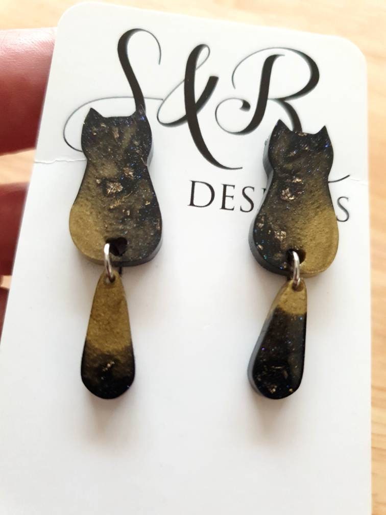Black Gold Cat Dangle Earrings, Cat with Moving Tail Long Earrings, Black and Gold Leaf Resin Earrings, Cat Earrings Stainless Steel.