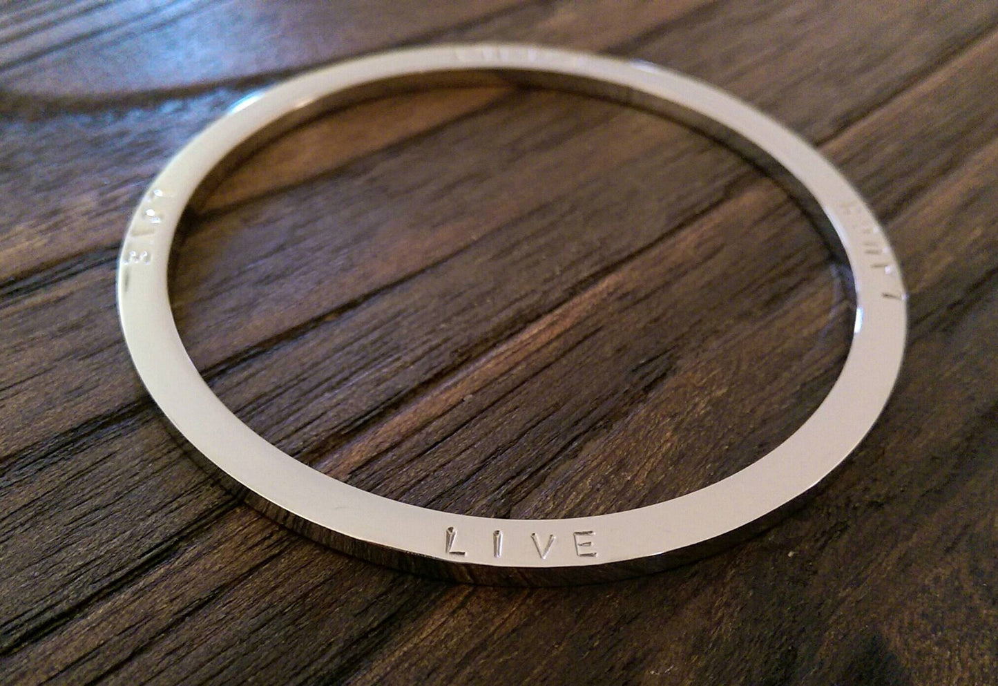 Hand Stamped Bangle Personalised Family Love Laugh Live Bangle Stainless Steel. Ready to post. Size Large 68mm inner diameter.