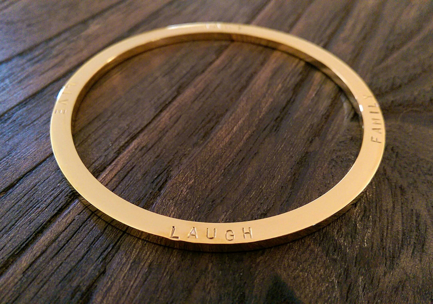Hand Stamped Bangle Personalised Family Love Laugh Live Bangle Stainless Steel. Ready to post. Size Large 68mm inner diameter.
