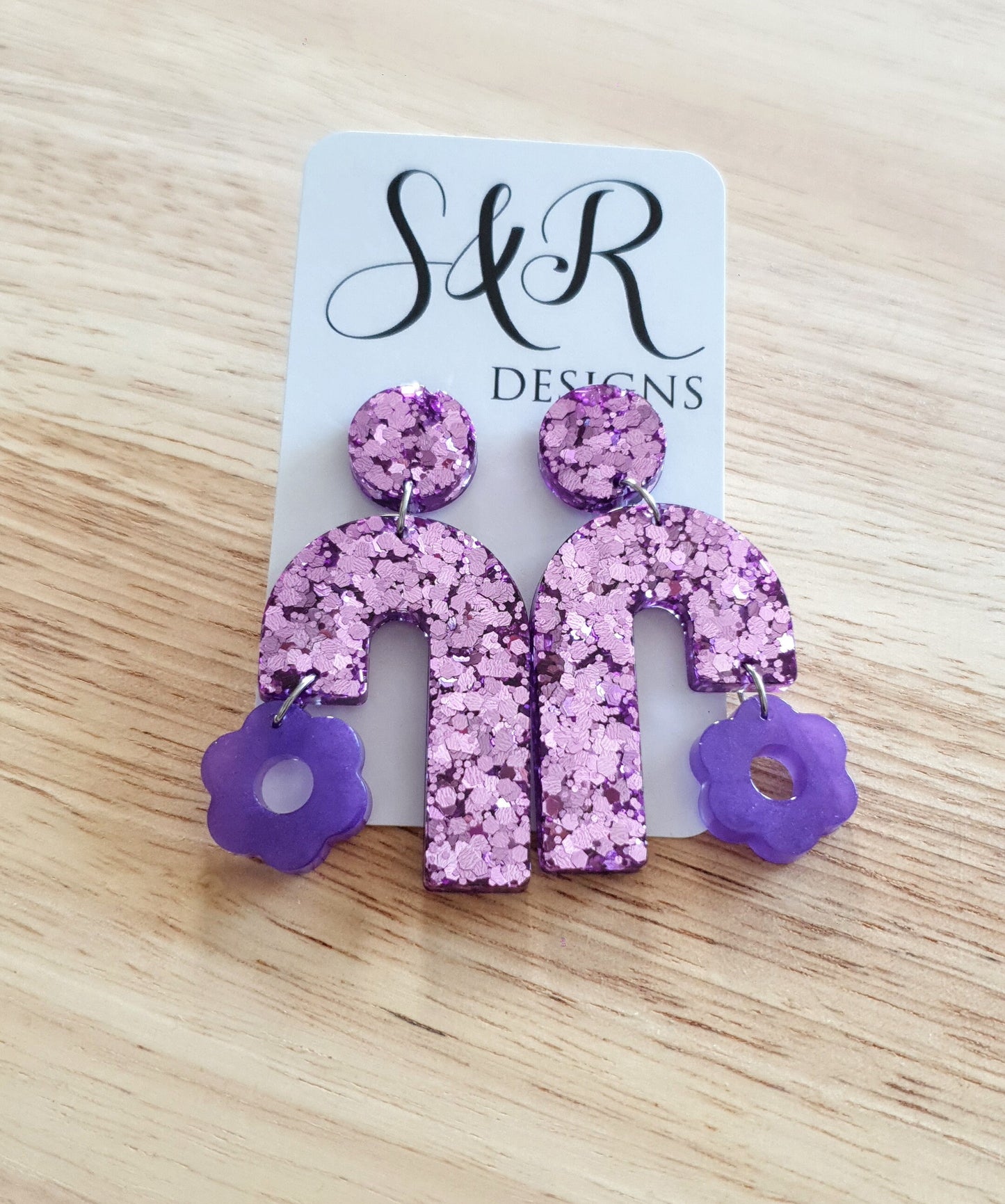 Blush Pink Arch Dangles with Purple Flower, Pink Glitter Resin, Purple Flower Charm, Statement Stainless Steel Earrings