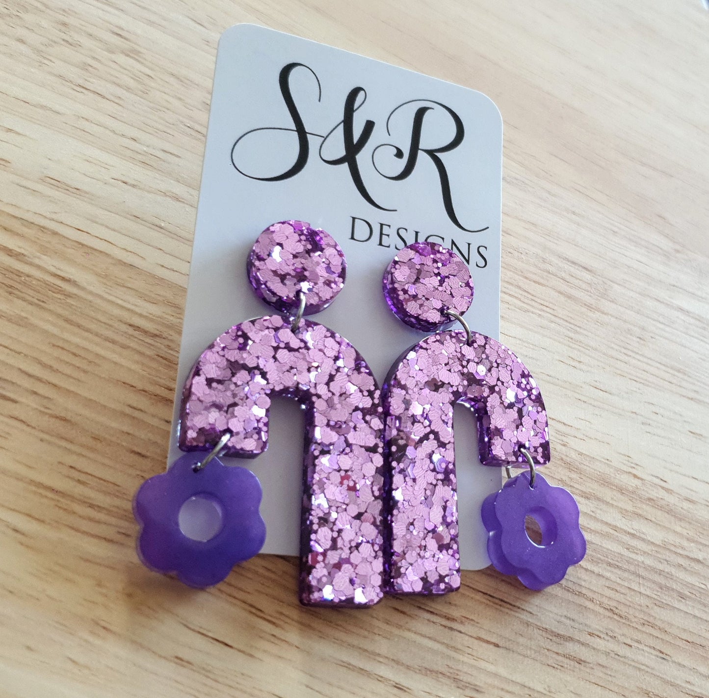 Blush Pink Arch Dangles with Purple Flower, Pink Glitter Resin, Purple Flower Charm, Statement Stainless Steel Earrings