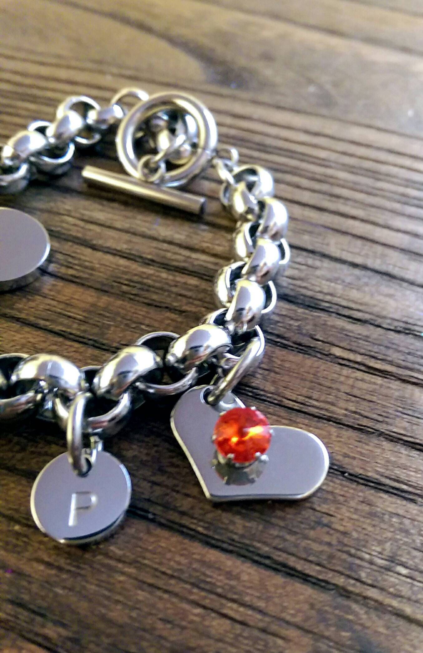 Stainless Steel Rolo Toggle Bracelet with Personalised Hand Stamped Charms and Birthstone Heart Charm.