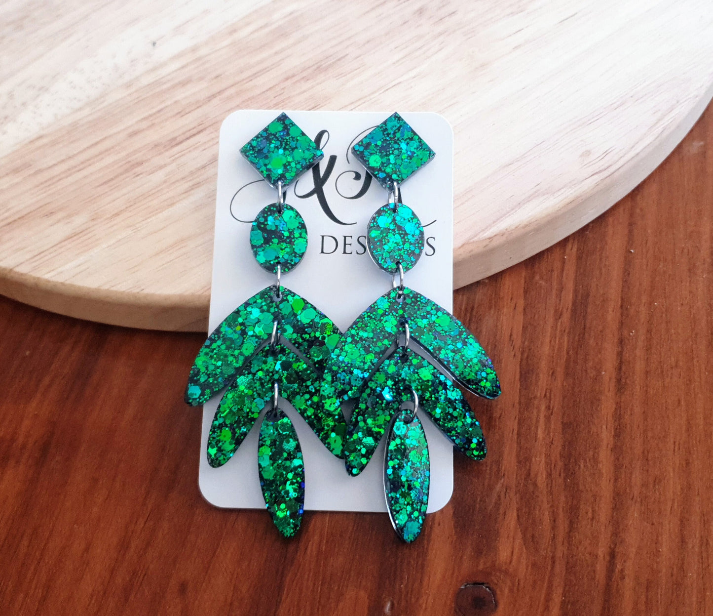 Dazzle in these Ocean Green Leaves Long Drop Earrings. Blue-green chameleon changing glitter resin dangles, Stunning Chandelier Statement