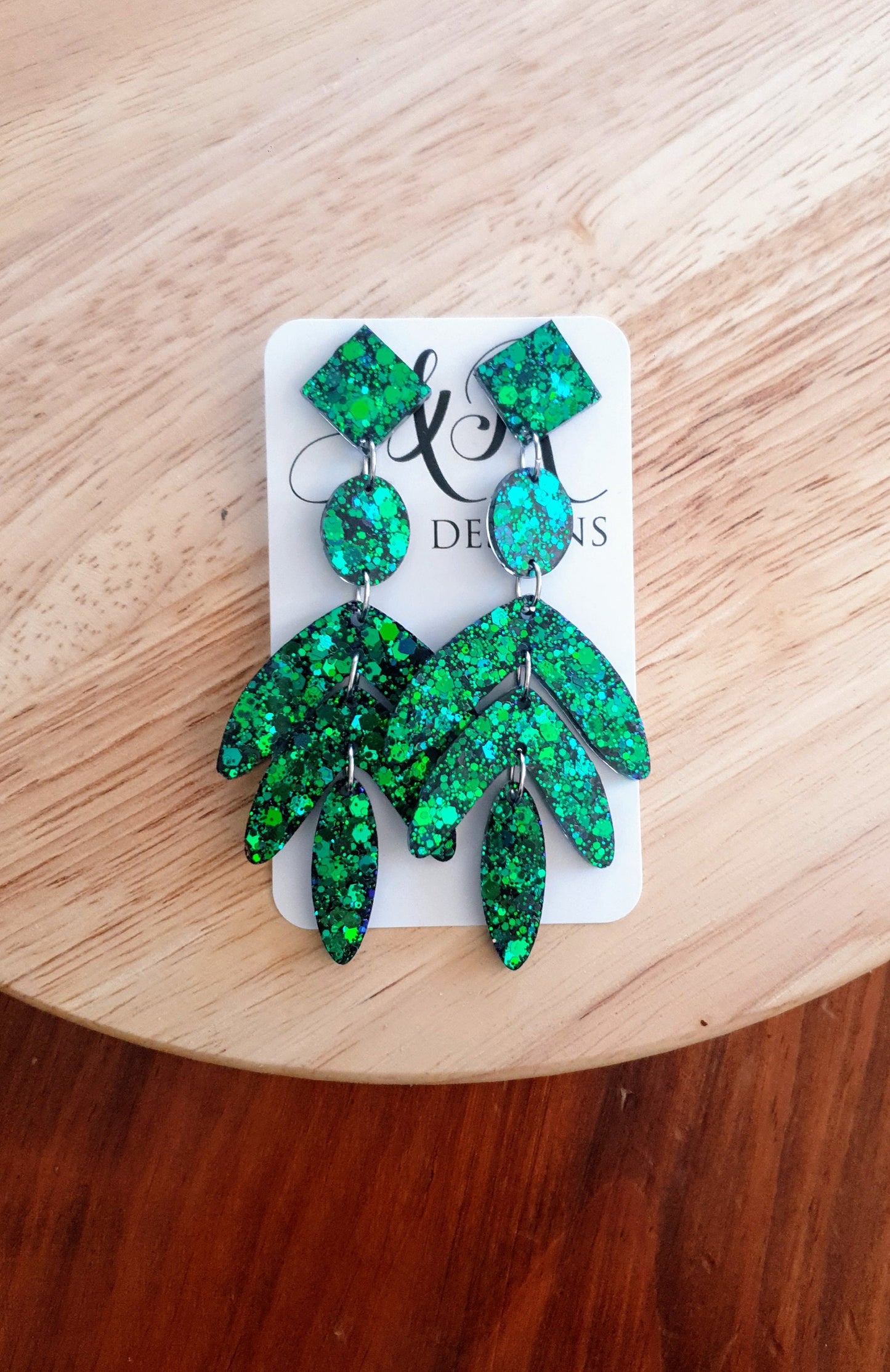 Dazzle in these Ocean Green Leaves Long Drop Earrings. Blue-green chameleon changing glitter resin dangles, Stunning Chandelier Statement