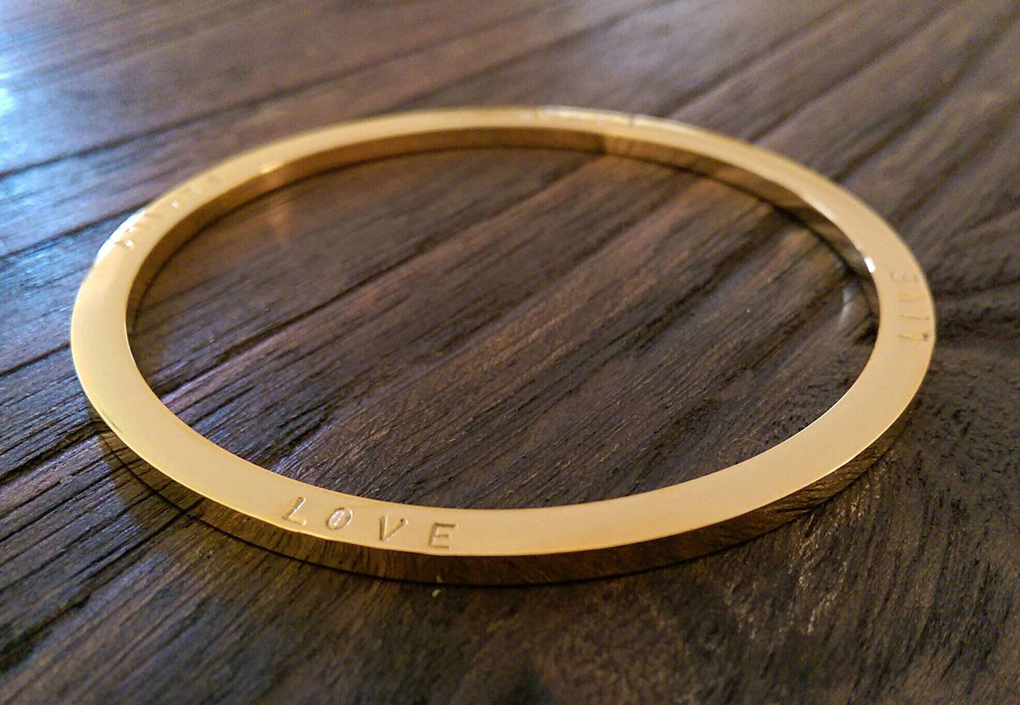 Hand Stamped Bangle Personalised Family Love Laugh Live Bangle Stainless Steel. Ready to post. Size Large 68mm inner diameter.