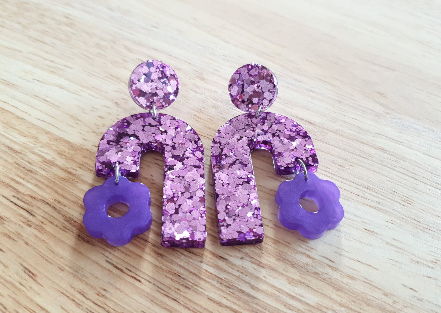 Blush Pink Arch Dangles with Purple Flower, Pink Glitter Resin,  Purple Flower Charm, Statement Stainless Steel Earrings
