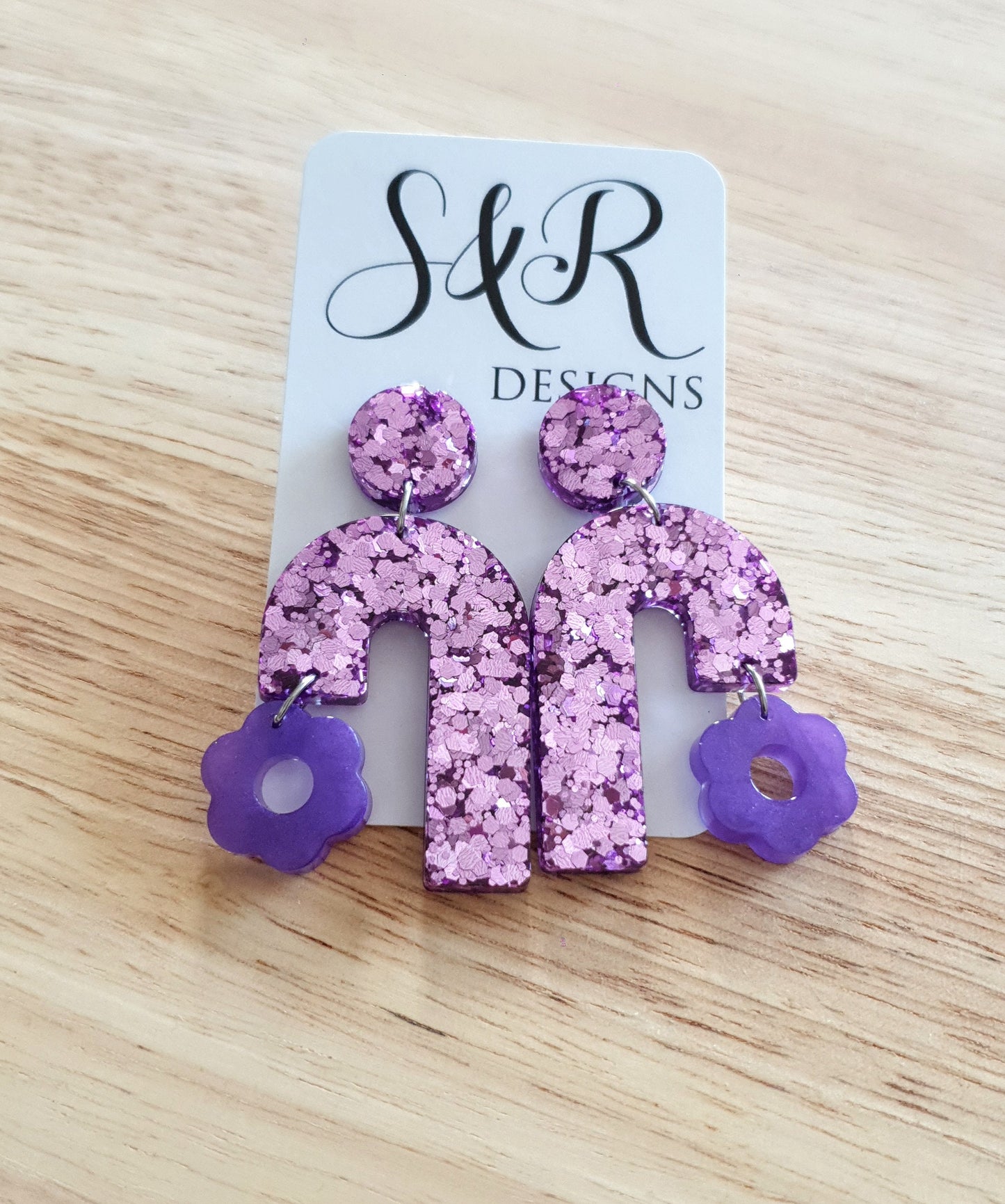 Blush Pink Arch Dangles with Purple Flower, Pink Glitter Resin,  Purple Flower Charm, Statement Stainless Steel Earrings