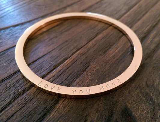 Hand stamped Bangle Personalised Love You More Bangle Stainless Steel. Ready to post. Size Large 68mm inner diameter. Choose colour.